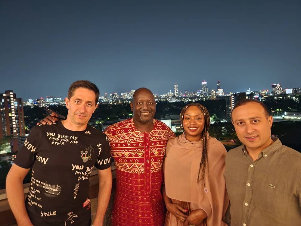 Participants at a rooftop bar in Boston