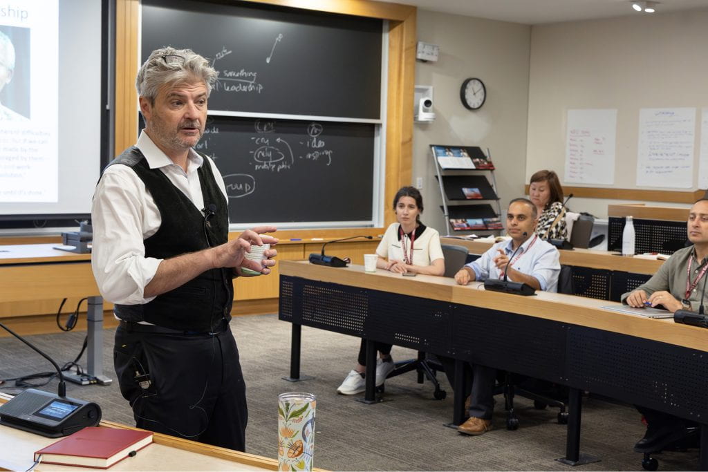 Matt Andrews teaching in classroom