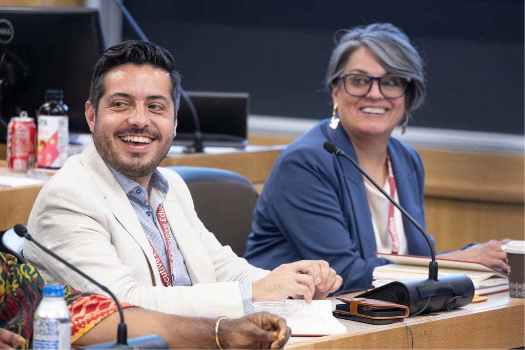 Candid photo of IPP participants smiling in classroom