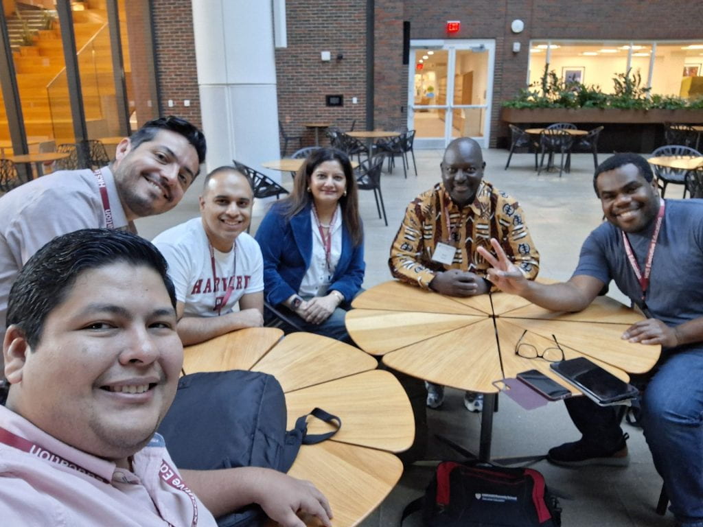 Participants smiling on campus