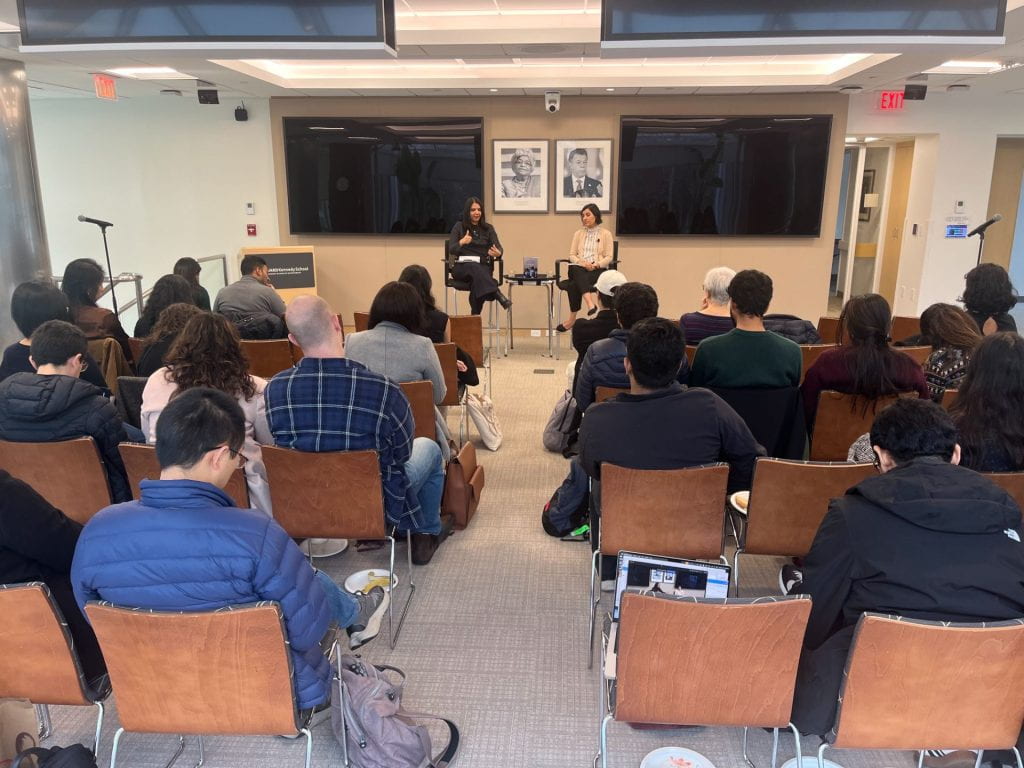 Students listening to a book talk