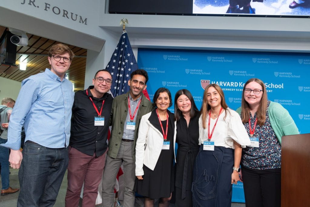HKS staff and alumni posing in JFK Forum and MPA/ID 25th reunion