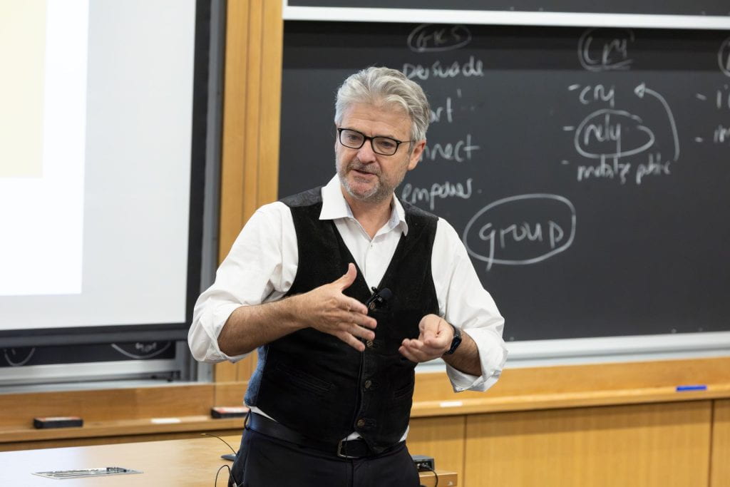 Matt Andrews teaching in classroom