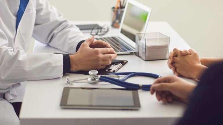 A doctor with patients