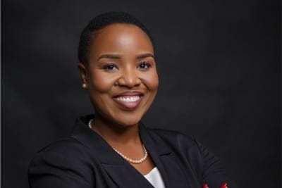 Professional headshot of Carolyn Kandusi.
