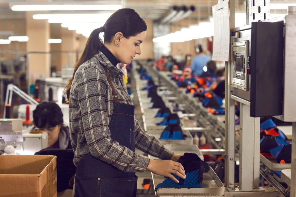 Woman working in a textile factory.