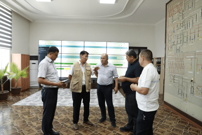 Members working together in a conference room.